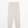 Flowing Sarouel Trousers with Pleated Detail
