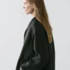 Flowing Voluminous Cape with Button Details