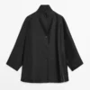 Flowing Voluminous Cape with Button Details